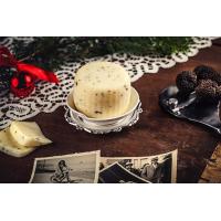 Mixed cheese embellished with flakes of black truffle Martarelli