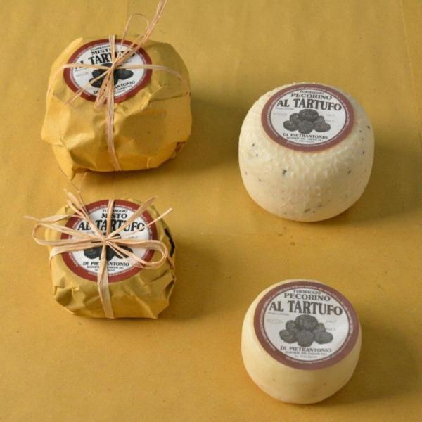 Italian mixed milk cheese with truffle family's dairy Di Pietrantonio